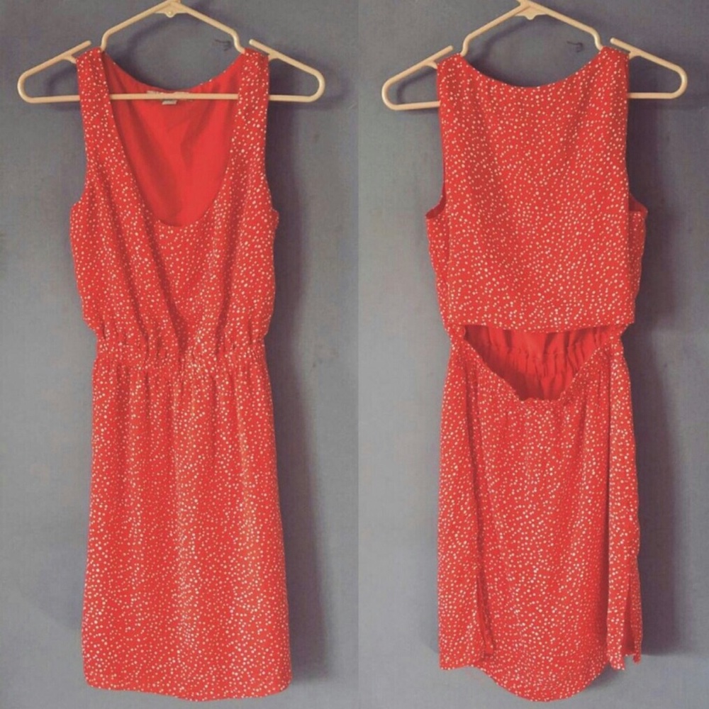 Red polkadot dress with a slight peekaboo back.